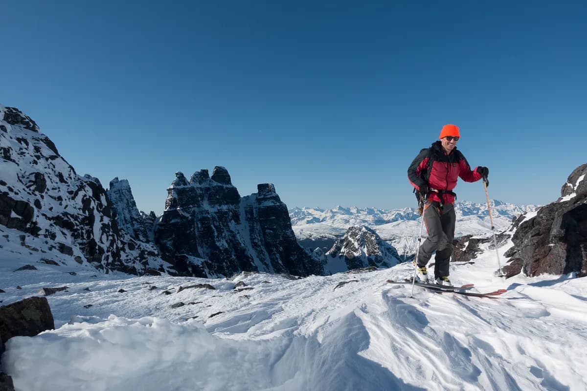 two people laughing in the snow